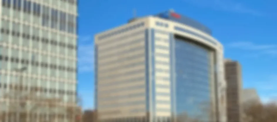 Bürogebäude von WACON Internet GmbH als verschwommenen Hintergrundgrafik